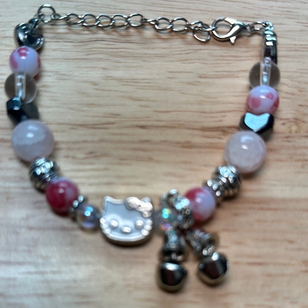 Source Unknown Pink and Silver Charm Bracelet with Hello Kitty Accent